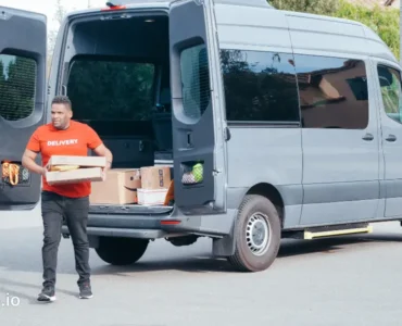 This photo shows a man who is delivering packages as an Amazon delivery partner.